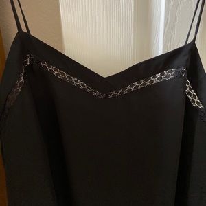 Brand new black sheer blouse.